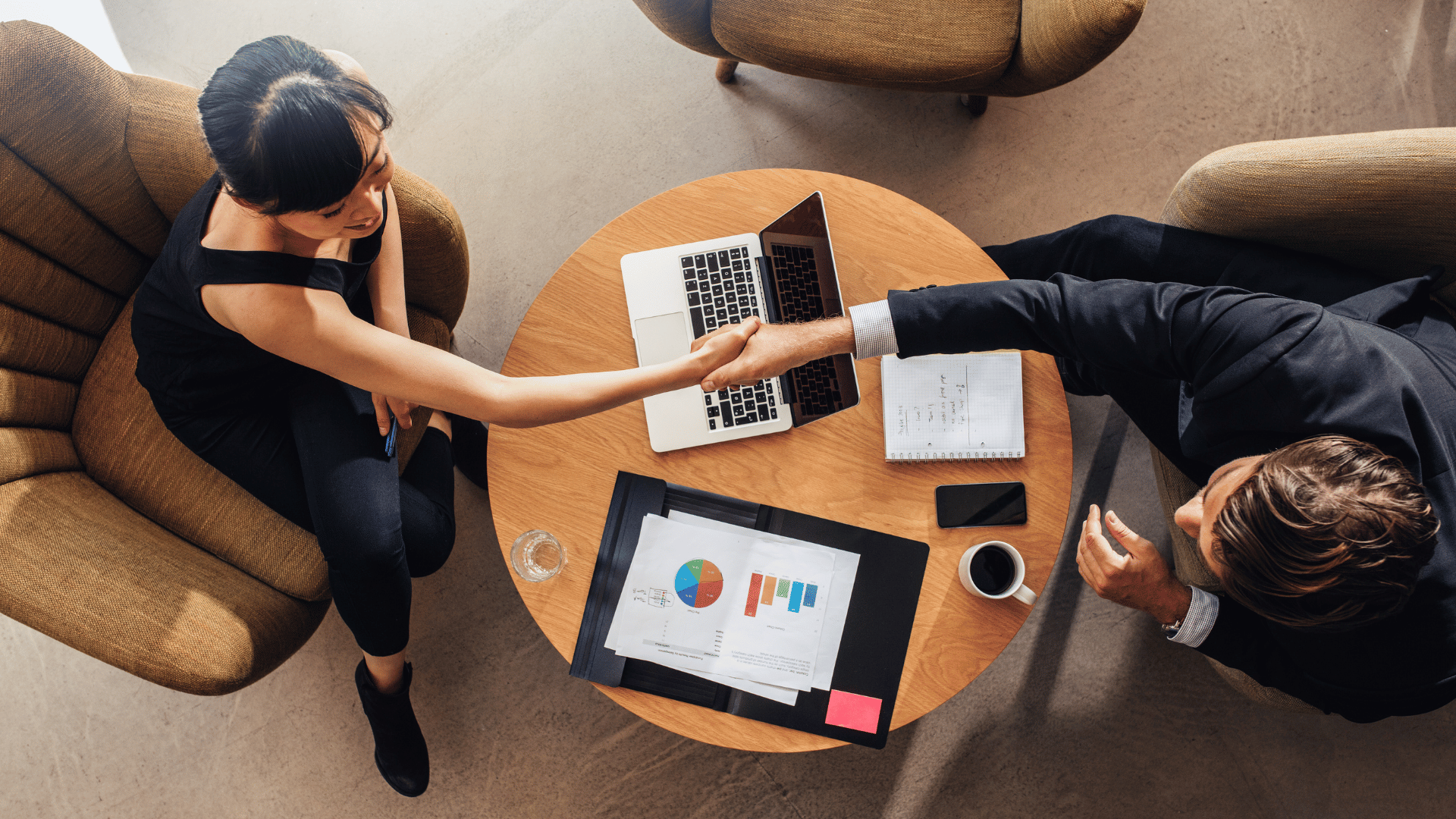 A business coaching helping a business leader navigate change in her business